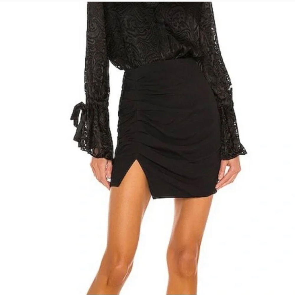 LOVERS + FRIENDS Mini Skirt In black  Size M